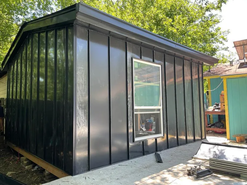 Black standing seam metal wall panels for Roof Inspection in Rosedale