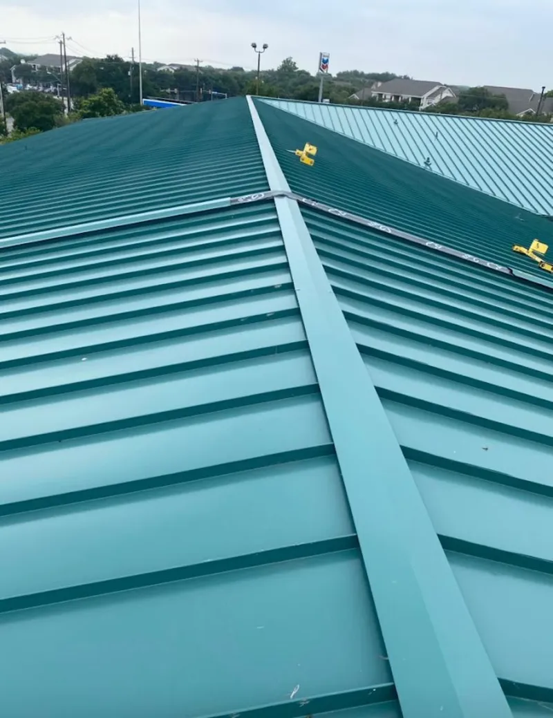Green commercial metal roof ridge and valley for Metal Roof Repair in Rosedale