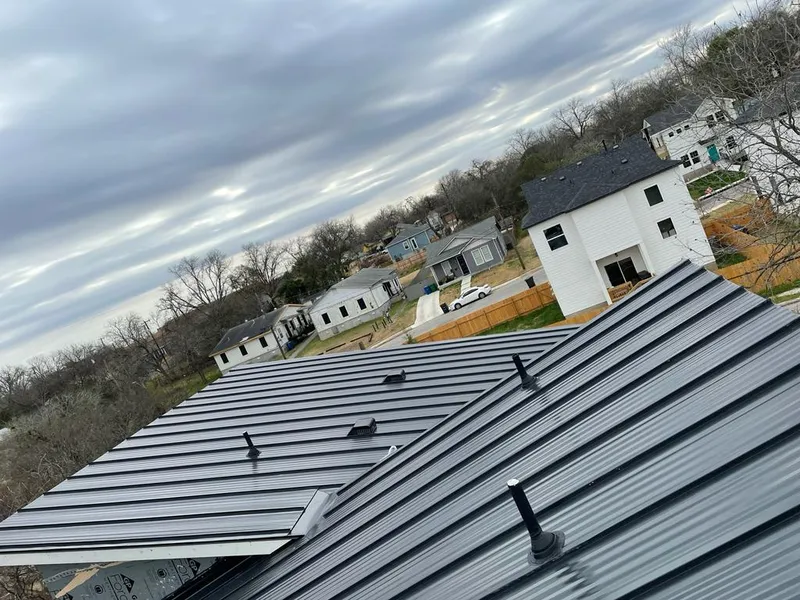 Standing seam metal roof panels with vents for Skylight Repair in Rosedale